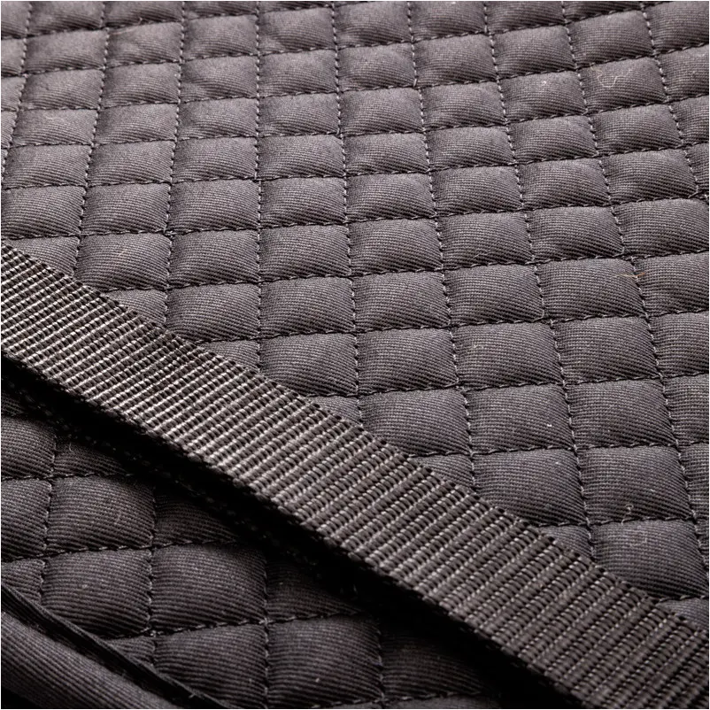 Schabracke Lammfell mit innenliegenden Taschen schwarz/natur