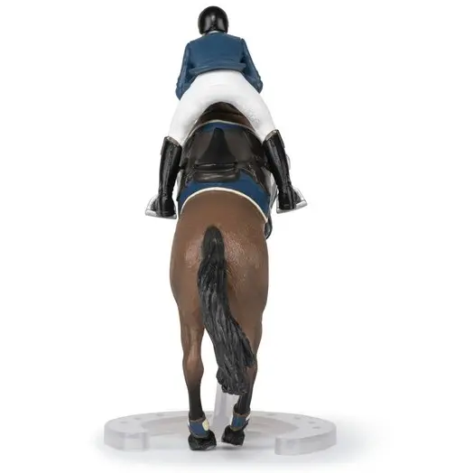 Springpferd mit Reiter